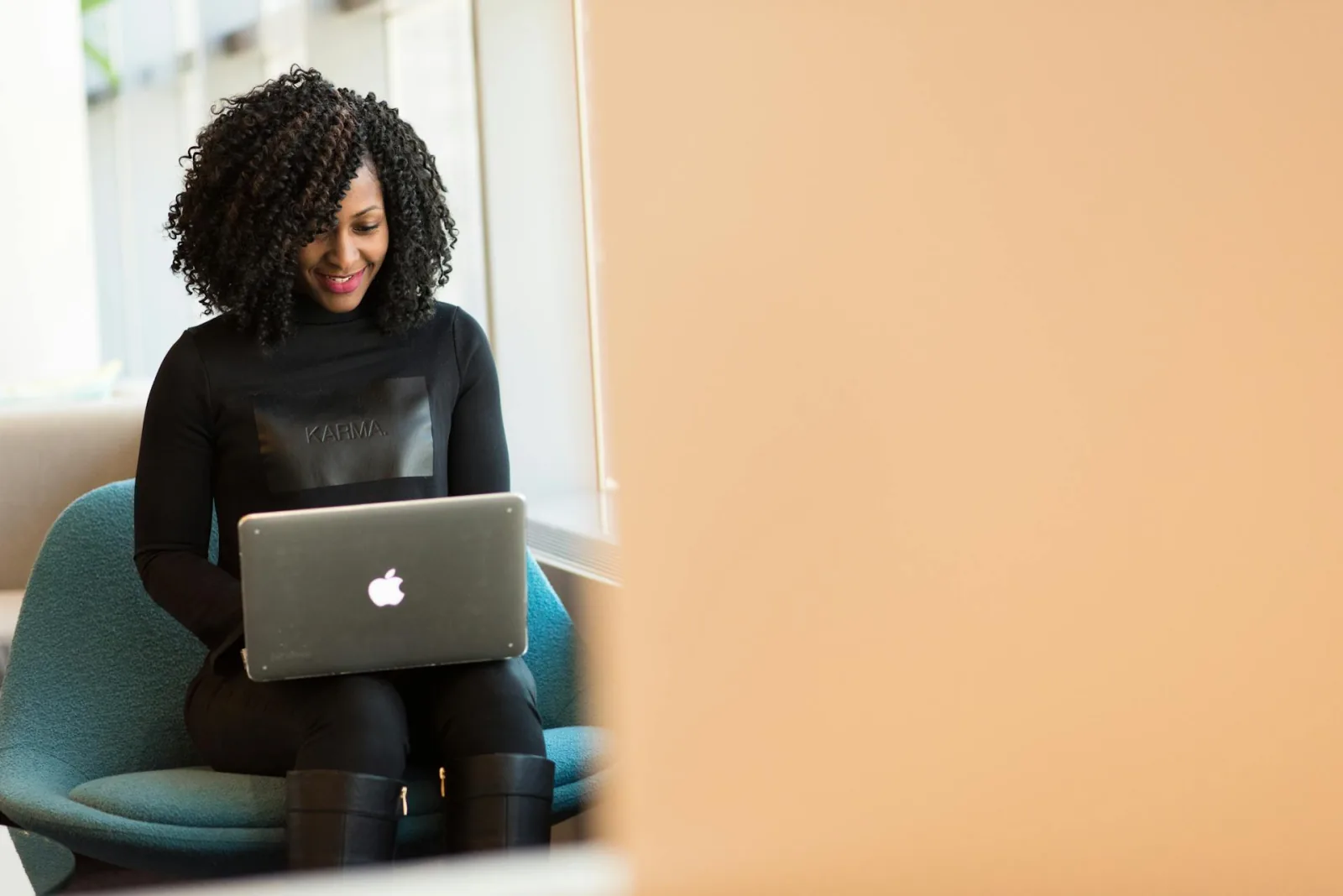 How to Build a Lead Funnel With Email Marketing image Woman Holding Macbook