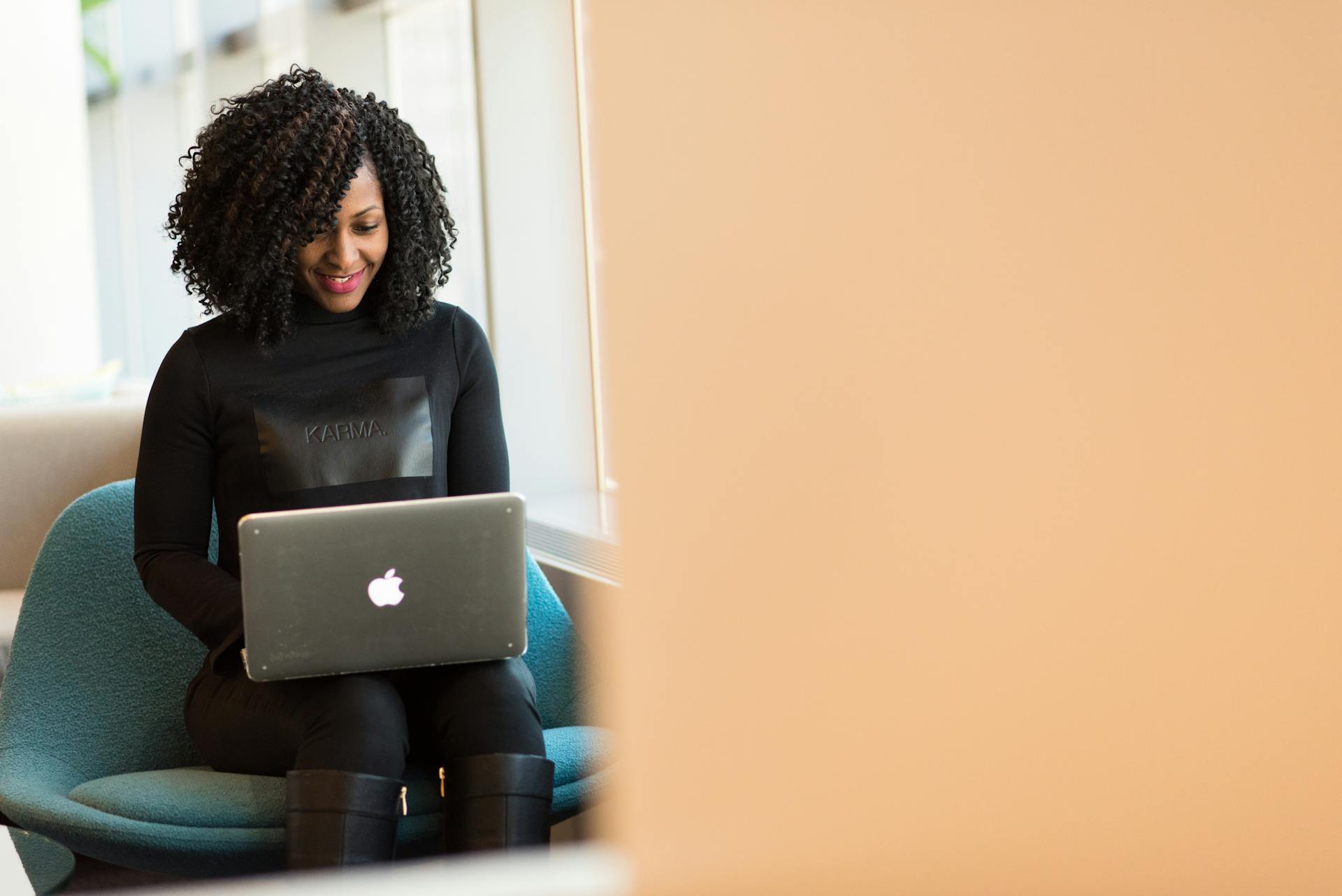 How to Build a Lead Funnel With Email Marketing image Woman Holding Macbook